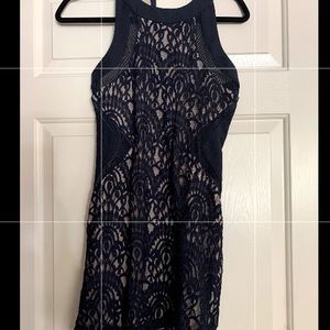 Navy blue, slim fitting sleeveless dress